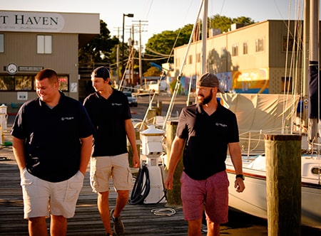 Marine Electric Systems Team Walking on Dock